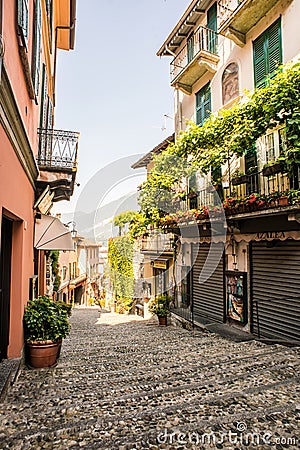 Bellagio. Lake Como. Amazing Old Narrow Street in Bellagio with Shops. Italy. Europe. Famous Picturesque Editorial Stock Photo