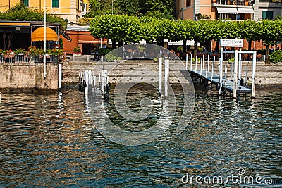 BELLAGIO ON LAKE COMO, ITALY, JUNE 15, 2014. View on coast line of Bellagio city on Lake Como, Italy. Lombardy region. Italian lan Editorial Stock Photo