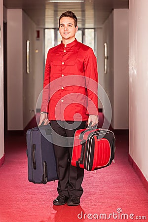 Bellboy with Luggages Stock Photo