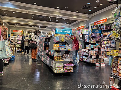 Bellevue, WA USA - circa December 2022: Wide view of people Christmas shopping for their children inside a toy store in the Editorial Stock Photo