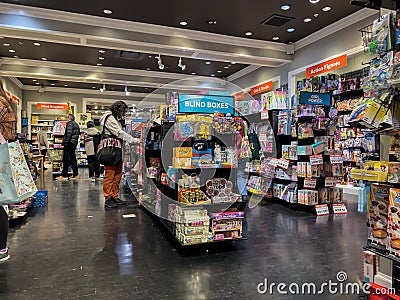 Bellevue, WA USA - circa December 2022: Wide view of people Christmas shopping for their children inside a toy store in the Editorial Stock Photo