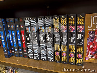 Bellevue, WA USA - circa July 2022: Close up focus on JoJo's Bizarre Adventure manga for sale inside a Barnes and Nobl Editorial Stock Photo