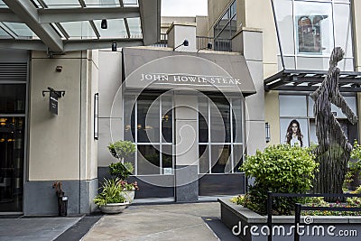 Bellevue, WA USA - circa June 2021: Street view of the exterior of John Howie Steakhoouse in the downtown area Editorial Stock Photo