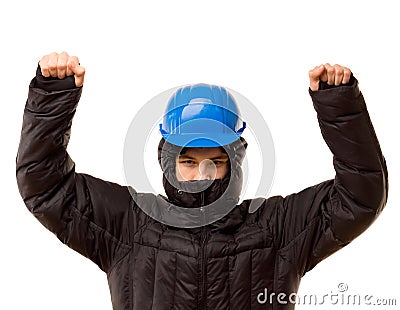 Belligerent young thug raising his arms Stock Photo