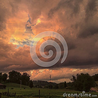 Bellowing clouds during a sunset Stock Photo