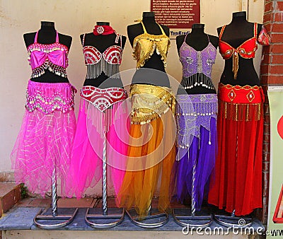 Belly dancer costumes on stands Editorial Stock Photo