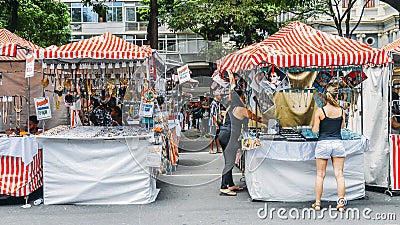 Indigenous Brazilian man selling arts and crafts at a street mar Editorial Stock Photo