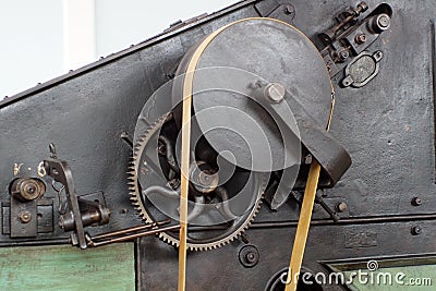 Belts and pulleys in an old cotton processing factory Stock Photo