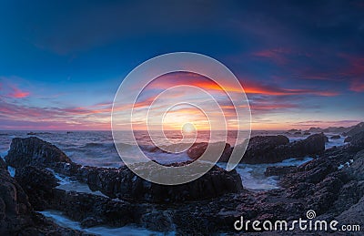 Beluga Rock sunset in super wide angle view Stock Photo