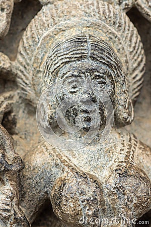 Closeup of Devi Lakshmi face at Chennakeshava Temple in Belur, India Stock Photo