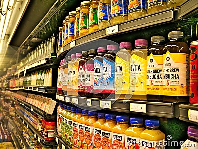 BEMIDJI, MN - 8 FEB 2019: Rows of bottled beverages stacked on shelves Editorial Stock Photo
