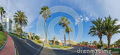 A roundabout street leading to the port in Benalmadena, a resort on the Costa del Sol near Malaga. Andalusia, Spain. Panorama Editorial Stock Photo