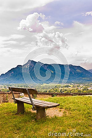 Bench with a beautiful mountain landscape view. Stock Photo