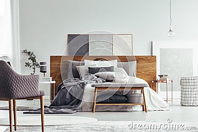 Bench in cozy bedroom interior Stock Photo