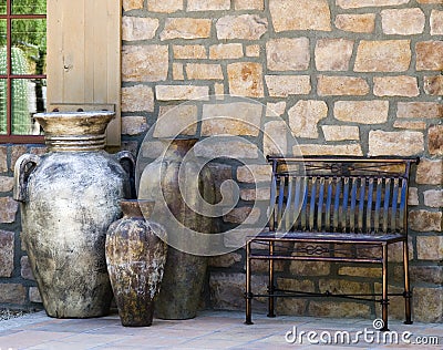 Bench and Decorative Urns Stock Photo