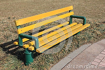 A bench on the grass Stock Photo