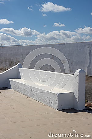 Bench infront of a church, Puerto Lajas, Fuerteventura Stock Photo