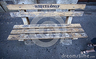 Bench with the inscription, as the memory of apartheid and segregation in South Africa Stock Photo