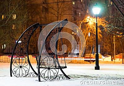 Bench in Moscow evening park background Stock Photo