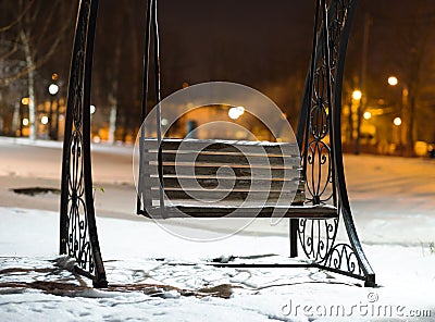 Bench in Moscow evening park background Stock Photo