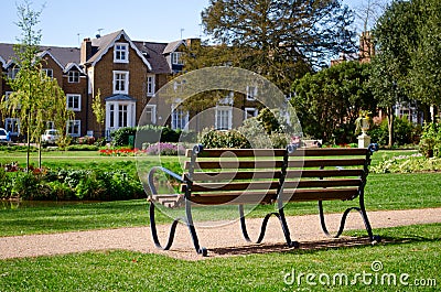 Bench overlooking homes Stock Photo