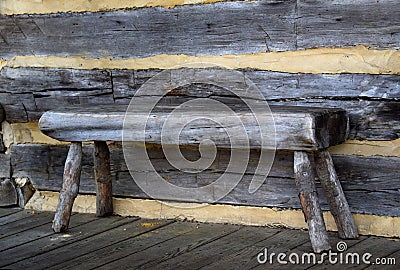 Bench Seat on Log Cabin Porch Stock Photo