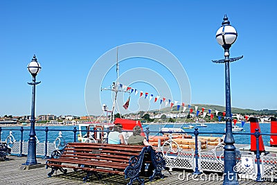 Bench on Swanage Pier. Editorial Stock Photo