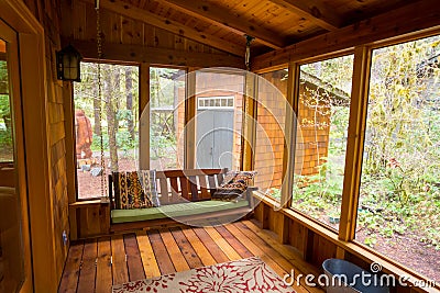 Bench Swing in Screened Porch Stock Photo