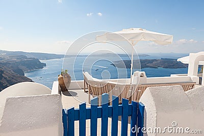 Bench on terrace overlooking Caldera of Santorini Greece Stock Photo