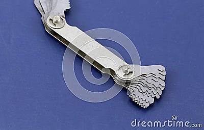 Bench tool for measuring thread pitch gauge. Stock Photo