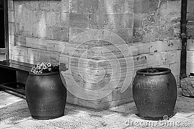 Bench and wine bowls with flowers near the Cana greek orthodox wedding church in Cana of Galilee, Kfar Kana Stock Photo