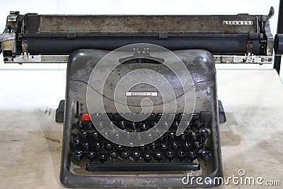 Benched steel Olivetti brand old school typewriter Editorial Stock Photo
