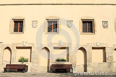 Benches and windows with crests on castle VlaÅ¡skÃ½ dvÅ¯r Stock Photo