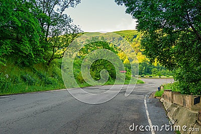 Bend and turn of the mountain road in the mountains of Transcaucasia Stock Photo