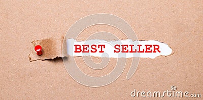 Beneath the torn strip of kraft paper attached with a red button is a white paper labeled BEST SELLER Stock Photo