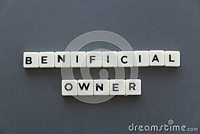 Beneficial owner word made of square letter word on grey background. Stock Photo