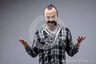 Benevolent smiling man opening his arms Stock Photo