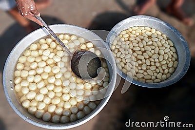 Bengal`s famous sweet `rasogolla` is manufacturing in the factory Stock Photo