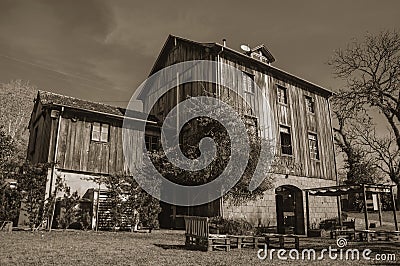 Charming old rural house made of wood and stone Editorial Stock Photo