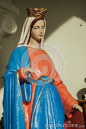 Statuettes of Virgin Mary in a shrine Editorial Stock Photo