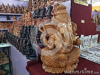 Bentota, Sri Lanka - May 04, 2018: Wooden statue of Ganesh Hindu God elephant head in a souvenir shop Editorial Stock Photo