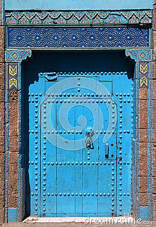 Berber blue Moroccan riad door and frame Stock Photo