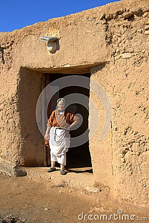 Berber woman standing at door of home Editorial Stock Photo