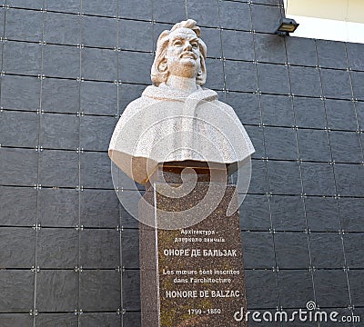 BERDICHEV, UKRAINE. Bust of the French writer Honore de Balzac 1799-1850. Ukrainian and french text Editorial Stock Photo