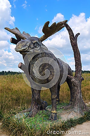 Berendeyevo, Moscow region, Russia, 26 July 2014, summer landscape with fabulous sculptures, moose. Public Park Editorial Stock Photo