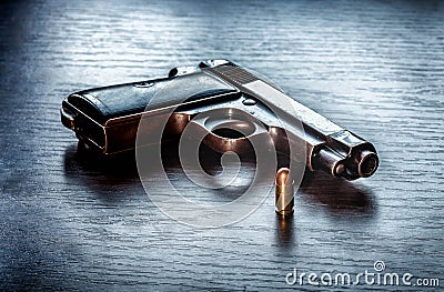 Beretta pistol with 9mm caliber bullet Stock Photo