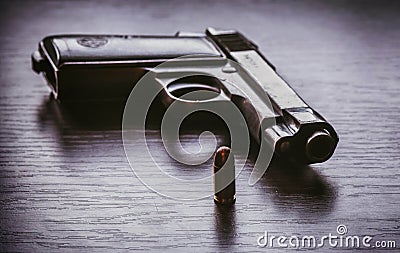 Beretta pistol with 9mm caliber bullet Stock Photo