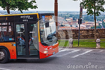 BERGAMO, ITALY - MAY 22, 2019: Public Bergamo bus climbing up the road to the Upper Town Citta Alta Editorial Stock Photo