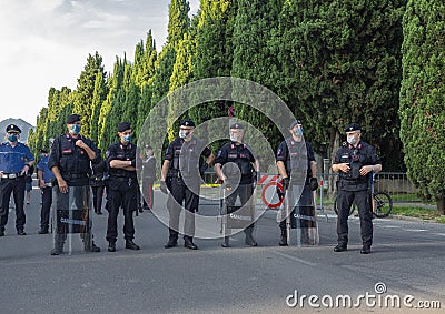 Bergamo, Italy. Police deployed in riot gear for the arrival of the President of the Republic in Bergamo Editorial Stock Photo