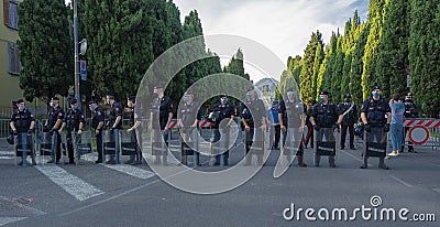 Bergamo, Italy. Police deployed in riot gear for the arrival of the President of the Republic in Bergamo Editorial Stock Photo